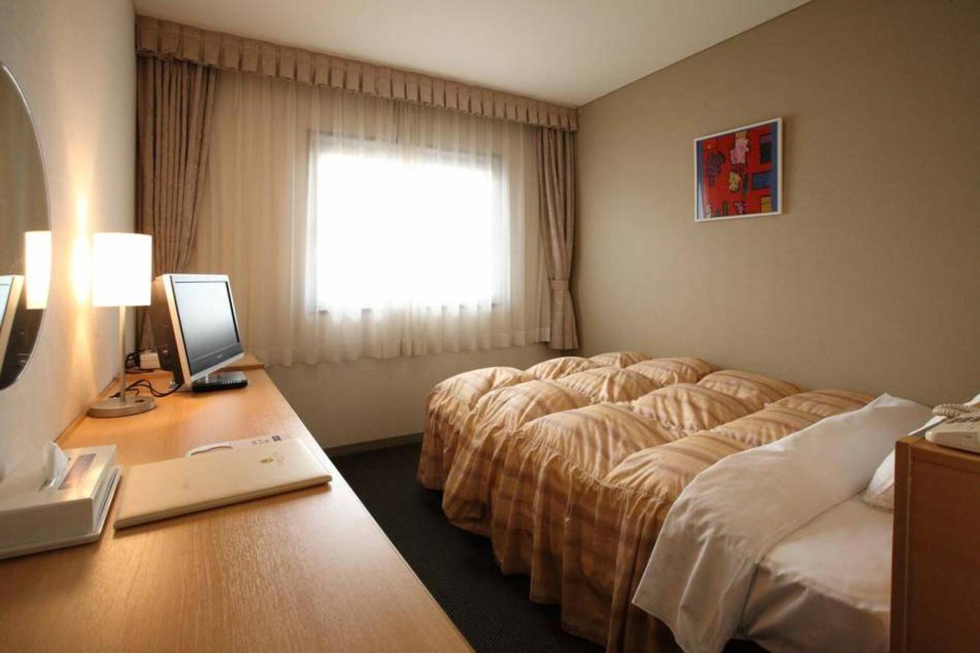 Okura Hotel Маругаме Екстериор снимка