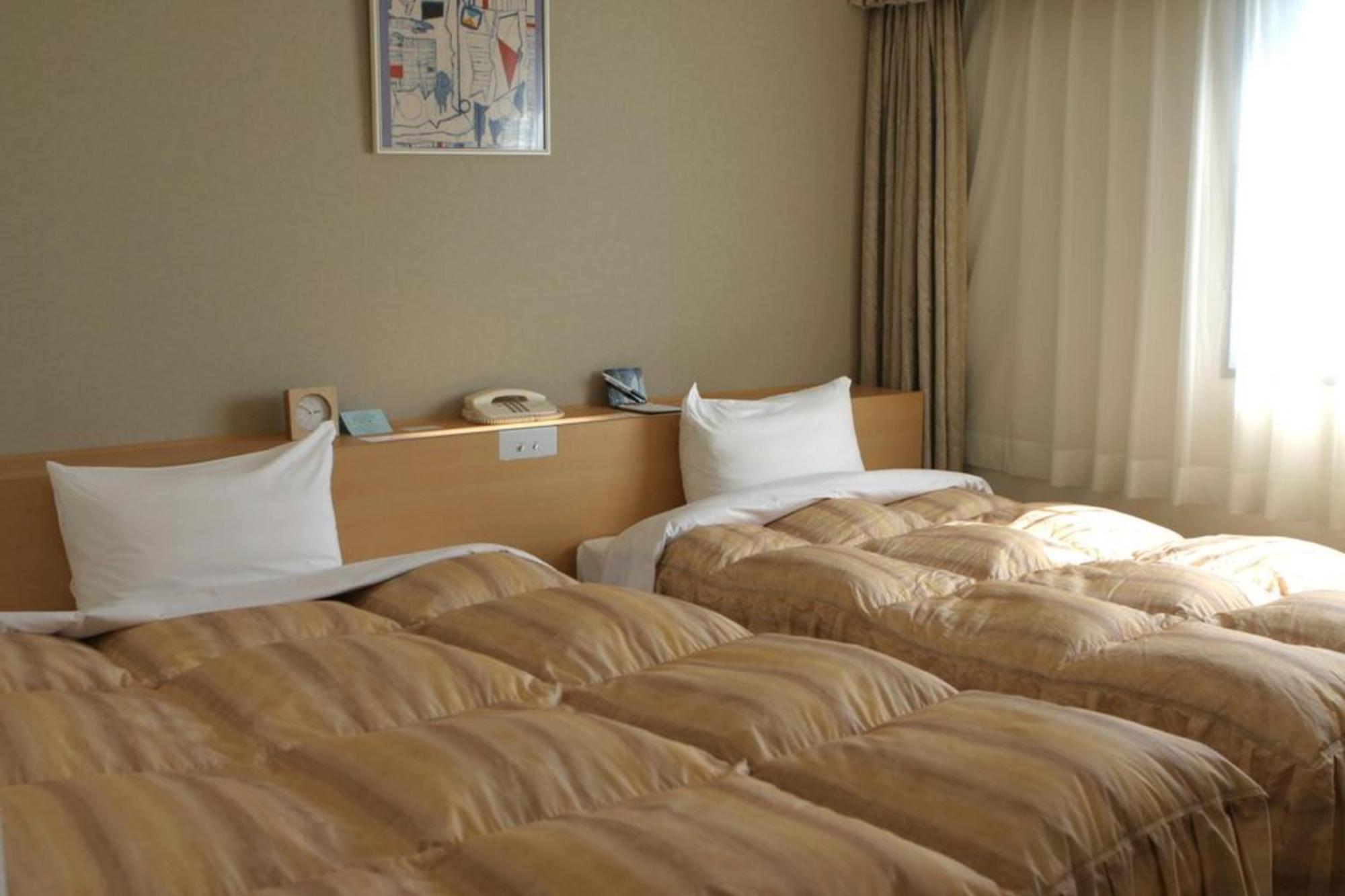 Okura Hotel Маругаме Екстериор снимка